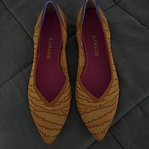 Rothy’s limited gold pattern with pink insoles. Never used, like new.  no box